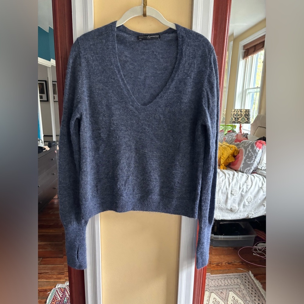 Blue Peruvian Connection cropped sweater with long sleeves with thumb holes